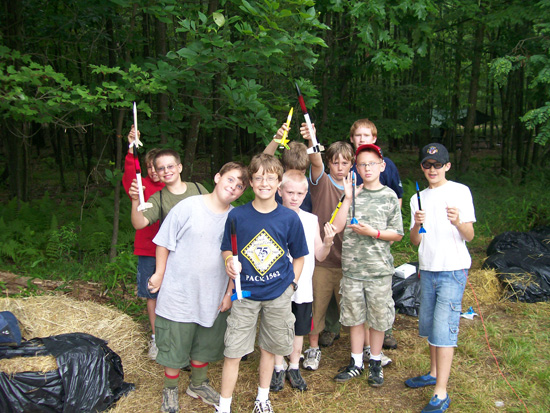 Scouts posing with their model rockets